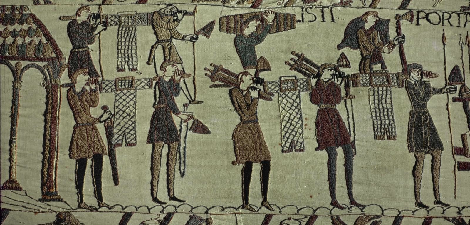 Die Bilder auf dem Teppich von Bayeux berichten von der Eroberung Englands durch den Normannenherzog Wilhelm 1066: Die Normannen beladen ihre Schiffe ...