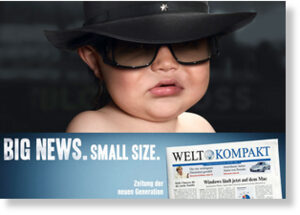 Klicken um zu vergrößern Anzeige für eine deutsche Zeitung mit einem niedlichen Baby. Was hat ein Baby mit einer Zeitung zu tun? Nichts, aber es erzeugt positive Assoziationen.