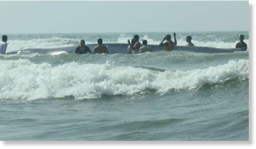 Volunteers of Sahyadri Nisarg Mitra and forest officials rescuing the stranded blue whale on Dapoli beach in Ratnagiri district. 