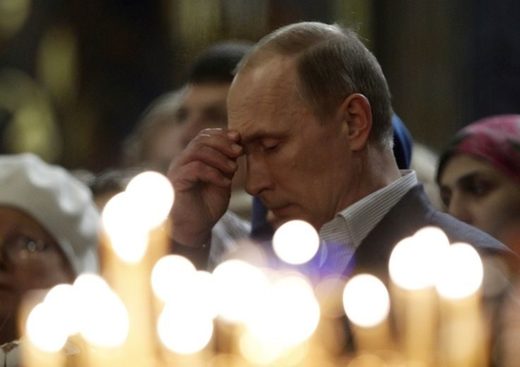Putin praying