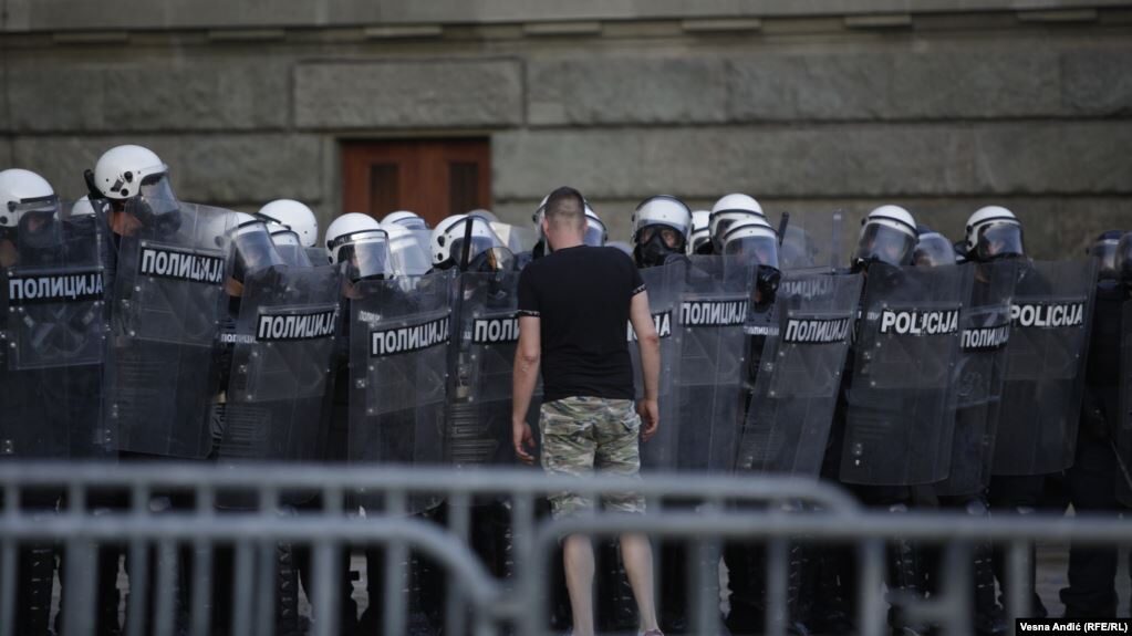 protester faces police Belgrade Serbia