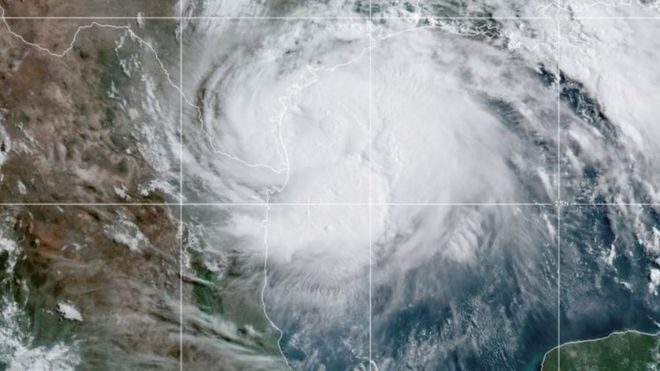 A satellite image shows Hurricane Hanna approaching the Texan coast
