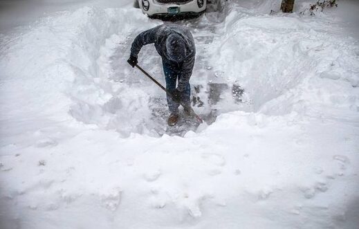 man shovel snow