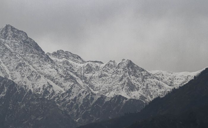 Snow-covered Dhauladhars after fresh snowfall in Shimla on Monday