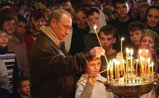 Putin lights a candle
