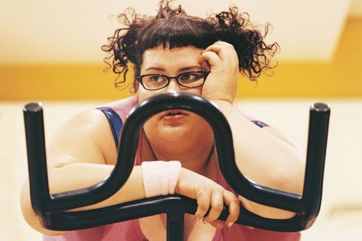 Übergewichtige Frau, Fitness-Studio
